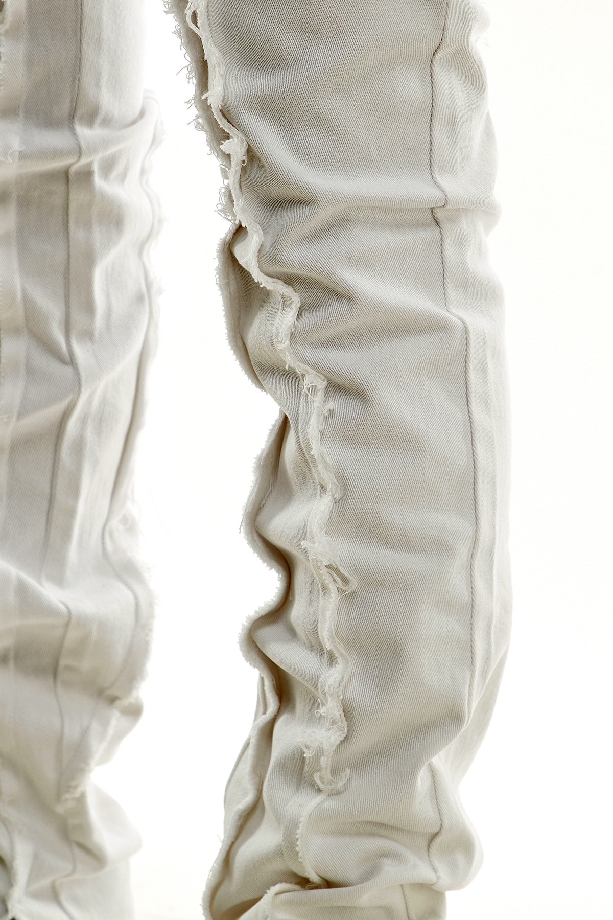 STACKED RAW PANTS